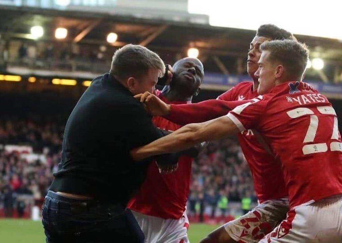 Fan banned for life after storming field, punching Nottingham Forest's Keinan Davis