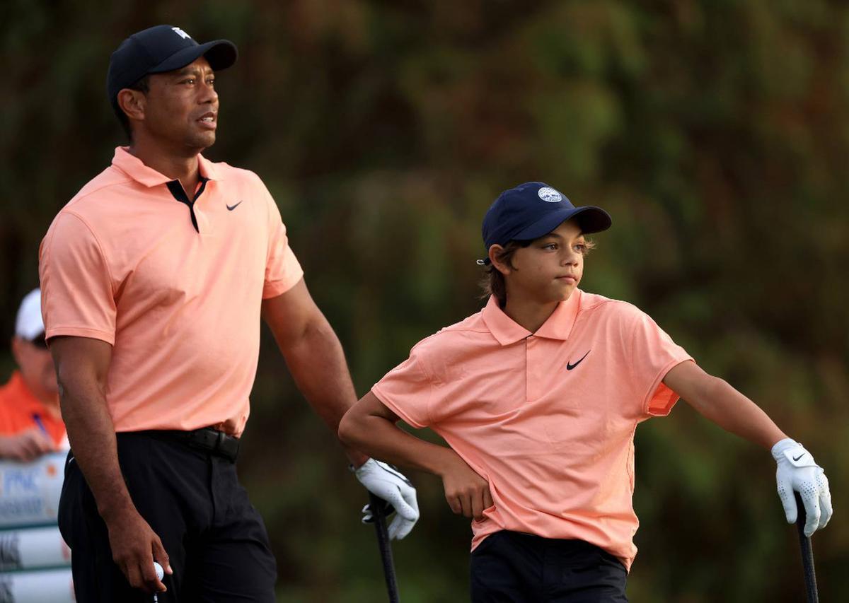 Tiger Woods makes golfing comeback but his son steals the show