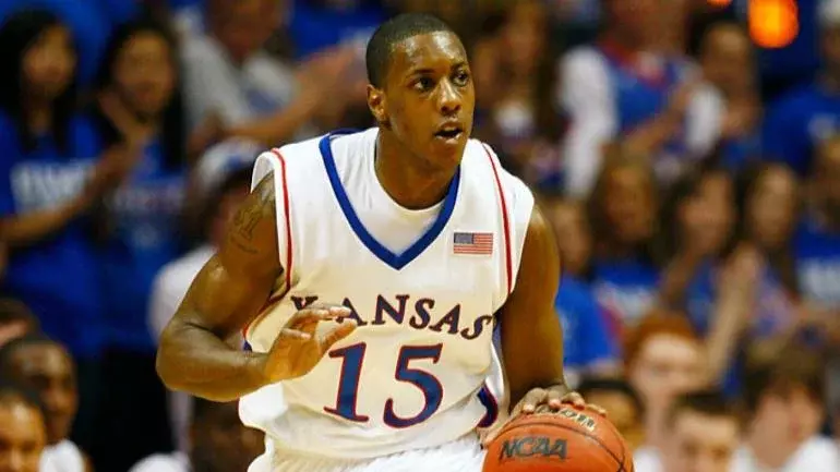 Former Kansas star Mario Chalmers sinks half-court shot at Late Night in the Phog